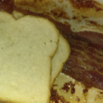 "Meatbread with Conjoined Piggy-Strips"